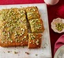 Pistachio and blood orange cake A rectangular sponge cake topped with chopped pistachios