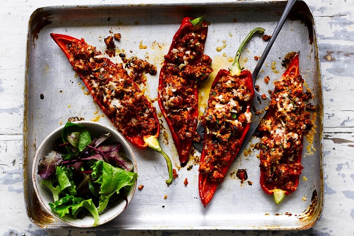 Italian sausage-stuffed peppers Four Romano red peppers filled with sausage meat