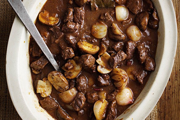 Beef Bourguignon Recipe Beef bourguignon stew in an oval dish