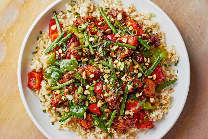 Takeaway-style chicken A takeaway-style chicken dish on a white plate