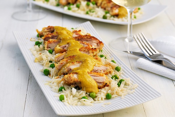 Chicken Katsu Curry Recipe Breaded chicken fillets with katsu sauce, on a bed of rice and peas