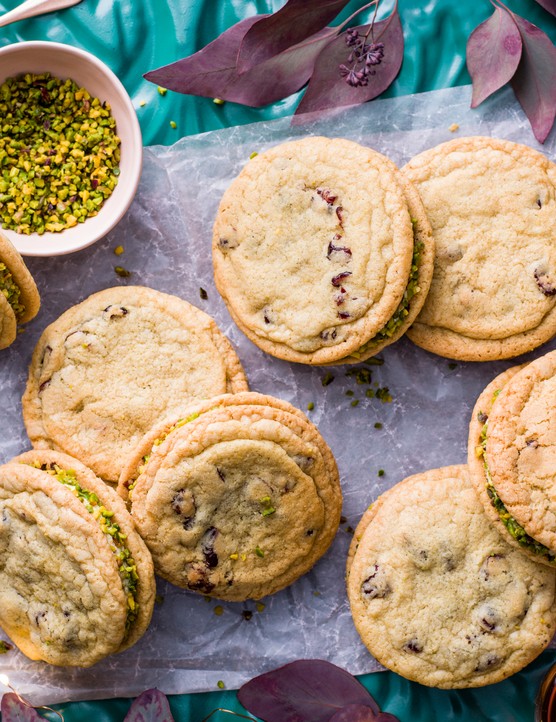 Festive cranberry cookies sandwiched with pistachio filling