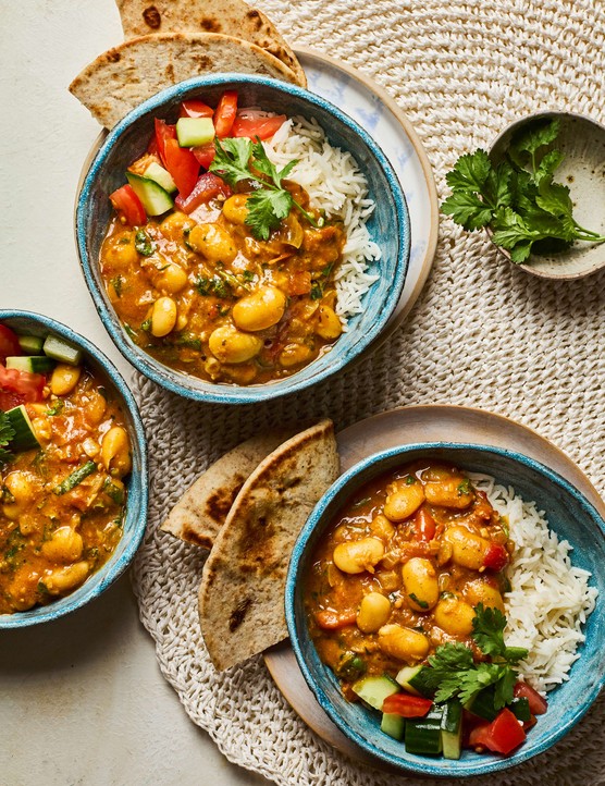 A Mauritian curry with fresh herbs on the side