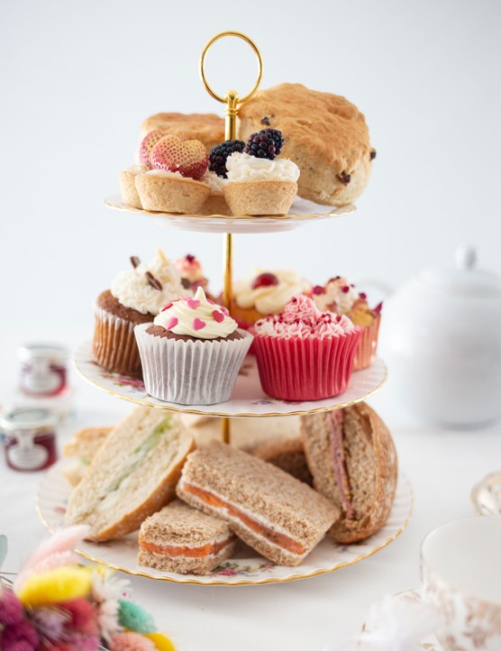 Sweet and savoury afternoon tea selection on three tier cake stand