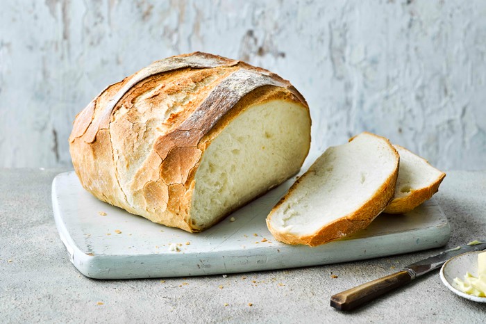 White loaf of bread cut into slices