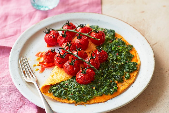 Healthy summer recipes Omelette Stuffed with Spinach with Tomatoes on the Side