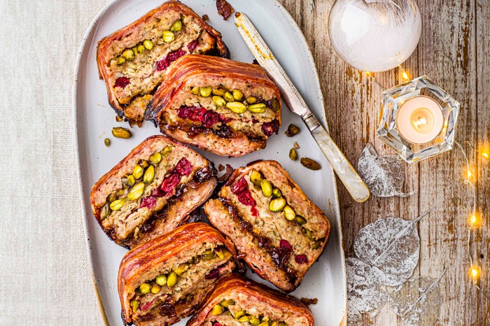 Christmas Stuffing Recipe Slices of layered stuffing on a large platter