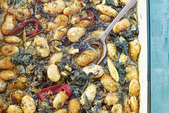 Gigantes with spinach and chard Dish of butter beans, spinach and chard