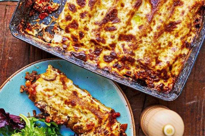 Beef cannelloni Beef cannelloni in a baking dish with a piece on the side on a plate