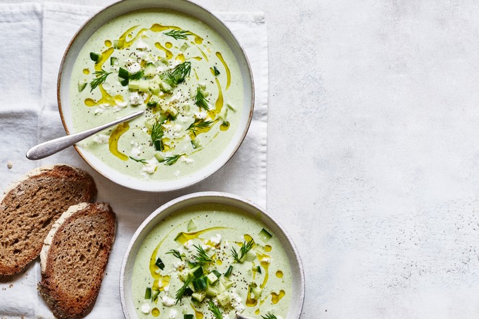 Healthy summer recipes Chilled Cucumber Soup with Yogurt and Dill in Two Bowls
