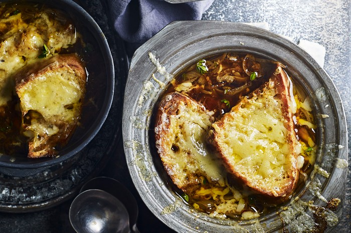 French onion soup Two bowls of French onion soup, topped with cheese toastie