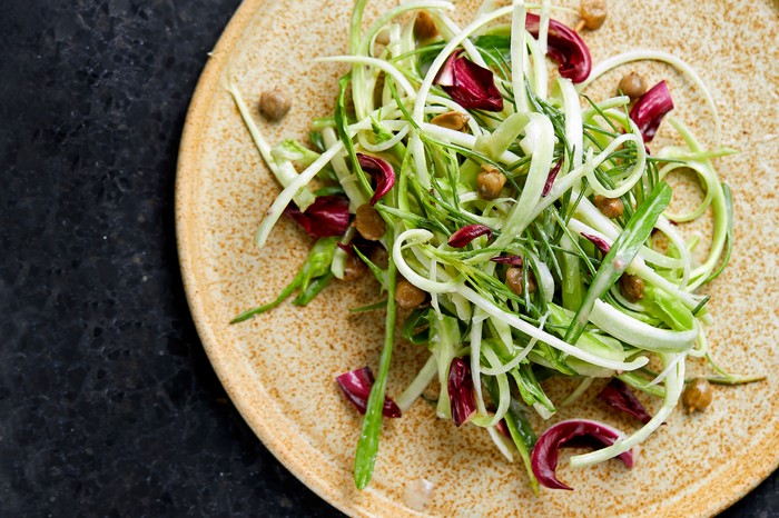 Puntarelle Salad Recipe With Anchovies And Capers A green salad plated up