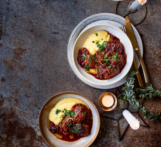 Venison stew with sloe gin and cheesy polenta, served in two bowls