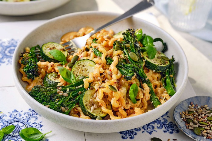 Whipped harissa tofu pasta A bowl of tofu pasta with plenty of greens