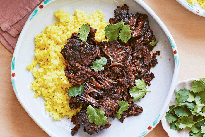 Eight-hour ox cheek rendang Eight-hour ox cheek rendang on a plate with fresh coriander
