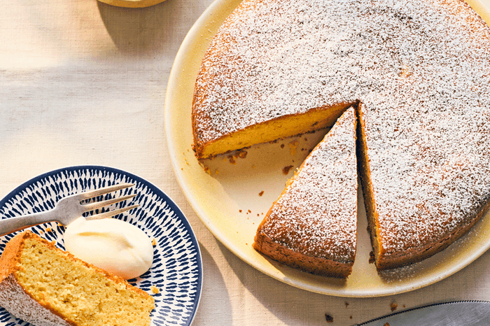 Olive oil cake Lemon and olive oil cake with a slice taken out on the side