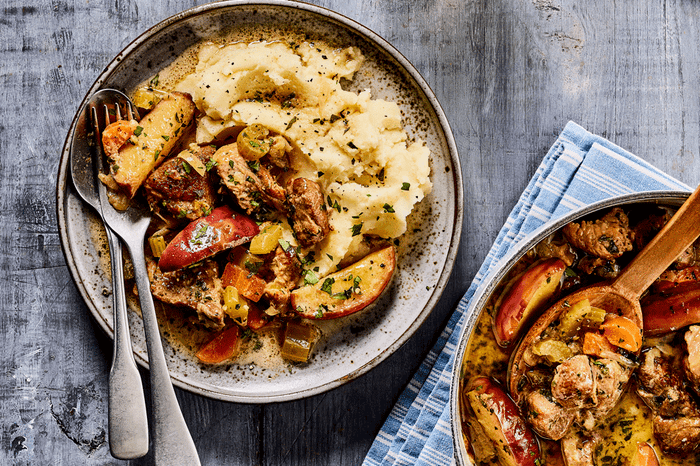 Two bowls of pork, apple and cider casserole